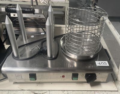 une photo d'une friteuse professionnelle surmontée d'un panier