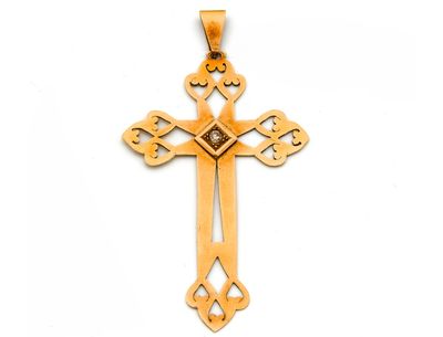 une image représentant une croix en bois avec un diamant au centre