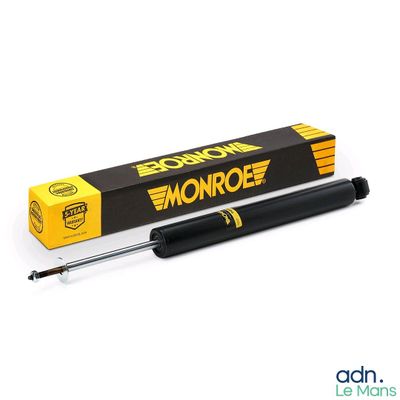 une boîte noire et jaune sur laquelle figure un logo noir et jaune
