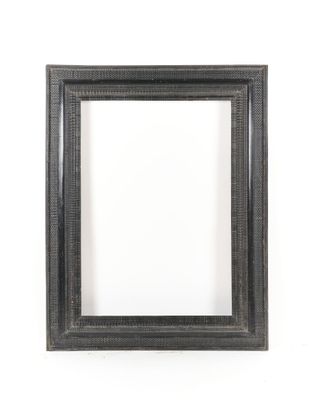 a black picture frame on a white wall with a white background
