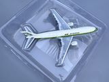 a model of an airplane in a plastic container
