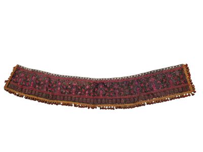 a red and black rug with fringes on a white background