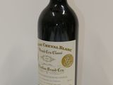 a bottle of wine that is sitting on a table