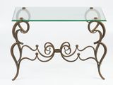 an image of a glass table with a metal frame and a glass top