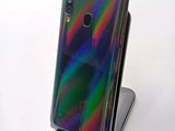 an image of a close up of a cell phone on a stand
