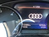 the dashboard of a car with a digital display on it