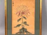 an image of a picture of a flower in a gold frame