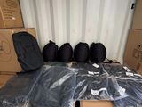 many bags of luggage in the back of a moving truck