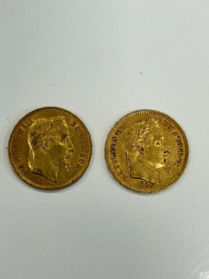 deux pièces d'or, dont l'une représente la tête d'un homme et l'autre celle d'une femme