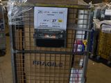 a cart that has a sign on it in a warehouse