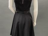 an image of a mannequin wearing a black dress on a mannequin mannequin