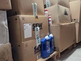 a lot of boxes stacked on pallets in a warehouse