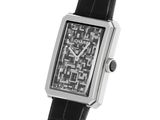 a watch that is sitting on a black leather strap