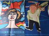 two posters of a man and a woman on a bed