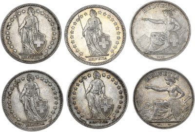 six types différents de pièces d'argent sur fond blanc