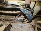 a bulldozer that is sitting in the dirt