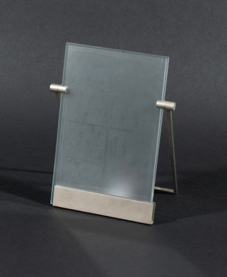 Cartier. Cadre photo en acier et verre dépoli.