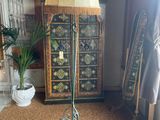 a lamp that is on a stand in a room