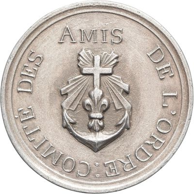an image of a silver coin with a cross and anchor on it