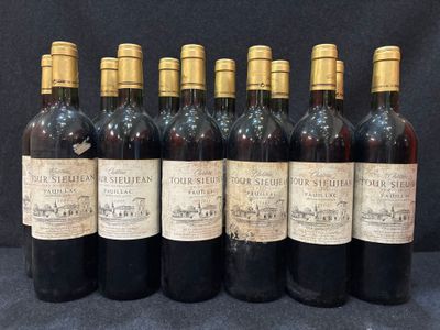 six bouteilles de vin sont alignées dans une rangée