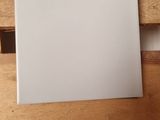 a picture of a piece of paper on top of a wooden table