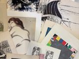 many different types of drawings on the table