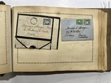 an open book with a lot of stamps on it