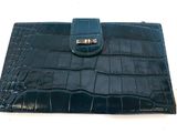 leather wallet with a clasp on the front and a clasp on the back