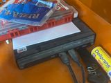 a box with a bunch of items on top of it