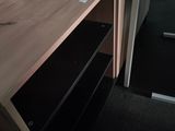 a microwave sitting on top of a counter in a kitchen