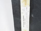 a piece of paper with a tag on it