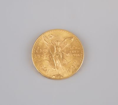 an image of a close up of a gold coin on a white surface