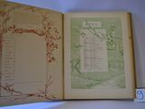 an open book with a picture of a tree on it