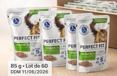 three bags of perfect fit cat food sitting on top of a wooden table