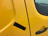 a close up of a car door handle with a sticker on it