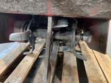 many pieces of wood stacked on top of each other