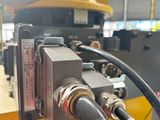an image of a close up of a machine in a factory