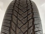 a close up view of a tire on a white surface