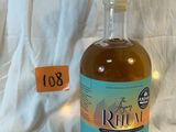 a bottle of rum that is sitting on a table