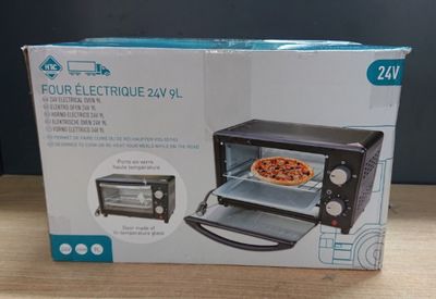 packaging of a black and white box with a pizza inside of it