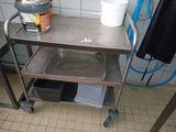 a metal cart with a bucket and a bucket on top of it