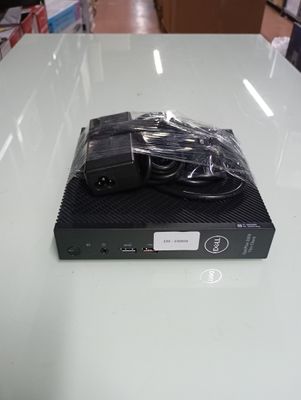 the box is on the table with the charger on top of it