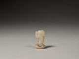 an old toothbrush sitting on top of a white surface