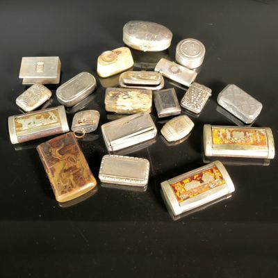 many different types of lighters sitting on a table