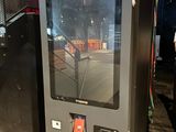 a machine that is sitting on the side of the street