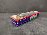 a close up of a box with a train on it on a table