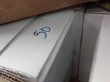 a cardboard box full of boxes with a pair of scissors on it