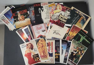 a lot of movie posters in a box on the table