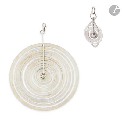 the earrings are white and have a spiral design on them