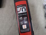 a black and red box with a red and white label